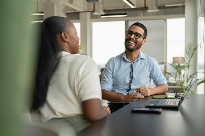 Male_and_female_colleague_in_meeting.jpg