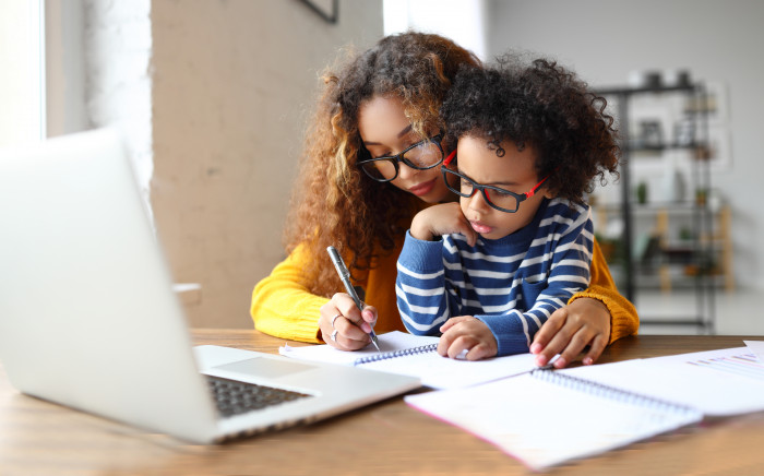 Colleague working with a young child on lap