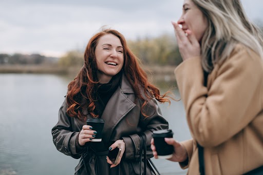 Ladies_smiling_and_having_coffee_together.jpg