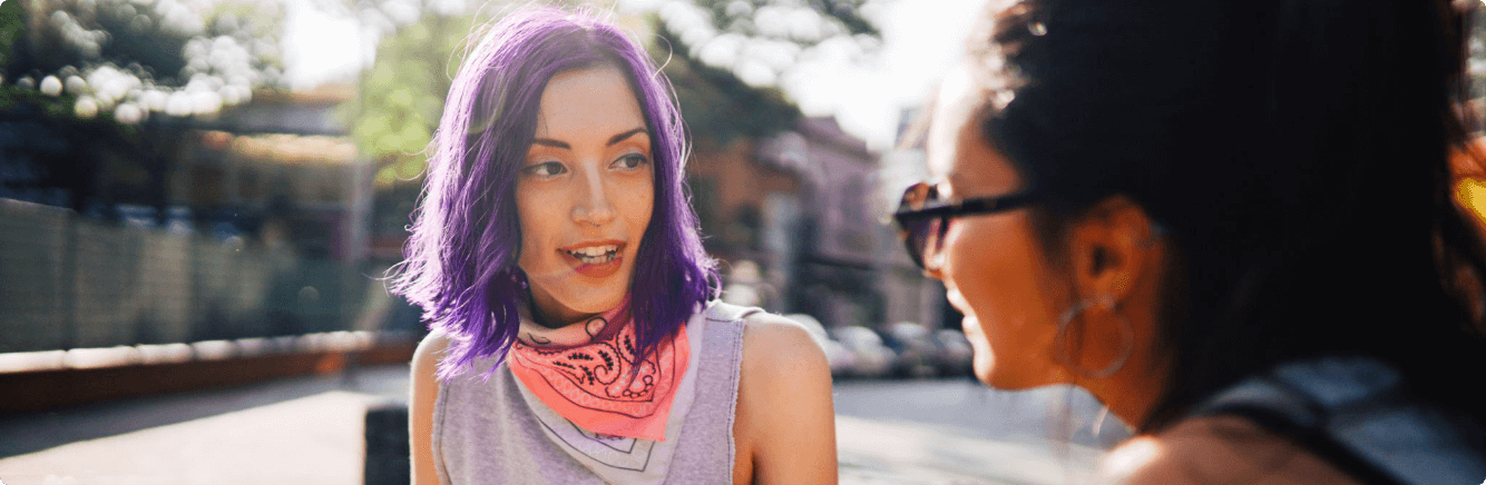 Two women having a chat outdoors