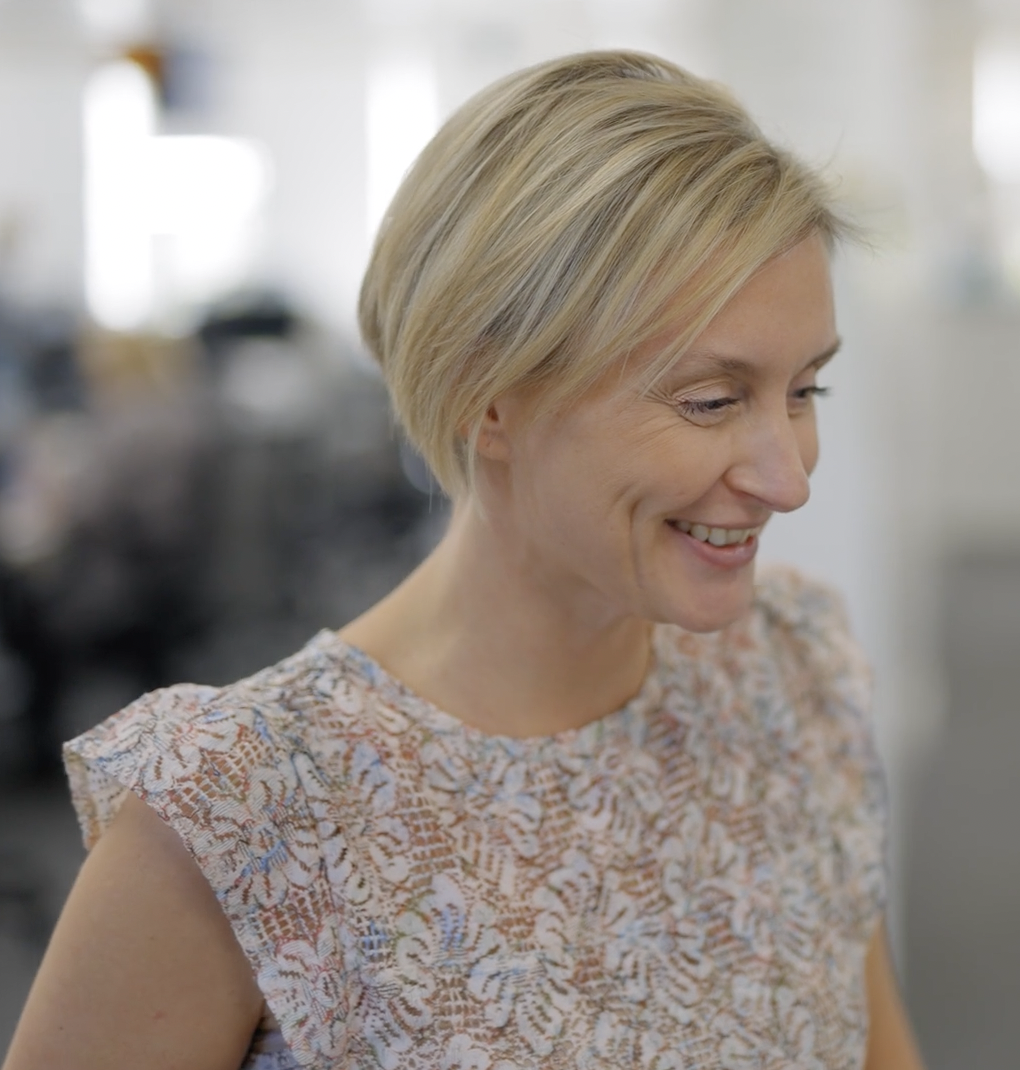 Female colleague smiling in the office